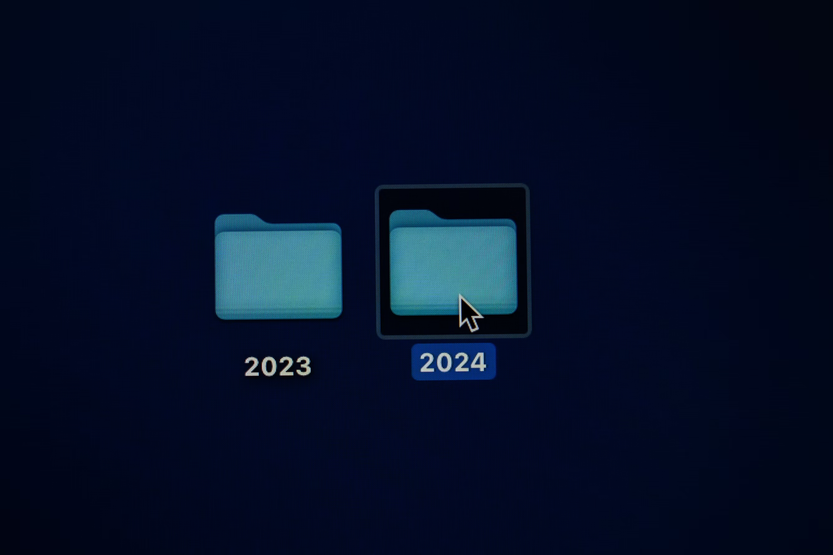 A 2023 folder and a 2024 folder, and 2024 folder about to be opened